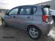 2011 Chevrolet Aveo 2LT z VIN KL1TG6DE1BB216827, wystawiony jako Copart lot #84419994 z przebiegiem 220 960 mil mil oraz Szkoda całkowita • Salvage title. Historia ofert i sprzedaży dostępna na DreamBid. Obrazek 2.