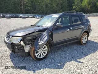 2011 Subaru Forester X Limited z VIN JF2SHBFC3BH711292, wystawiony jako Copart lot #61084015 z przebiegiem 103 472 mil mil oraz Szkoda całkowita • Salvage title. Historia ofert i sprzedaży dostępna na DreamBid. Obrazek 1.
