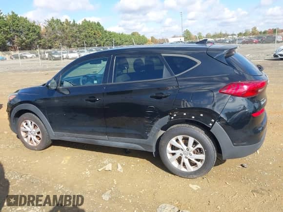 2019 Hyundai Tucson SE z VIN KM8J2CA44KU850030, wystawiony jako IAAI lot #43610446 z przebiegiem 113 933 mil mil oraz . Historia ofert i sprzedaży dostępna na DreamBid. Obrazek 14.