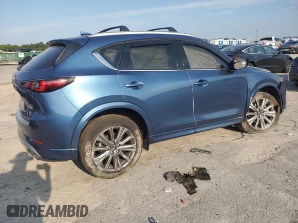 ✅ 2024 Mazda CX-5 Signature • VIN: JM3KFBXY8R0484986 • Lot: 70501015. Wystawiony na Copart z przebiegiem 9 604 mil. Bezpłatny archiwum sprzedaży aukcyjnych z USA i szczegółowy raport historii pojazdu na DreamBid. Zdjęcie 3.