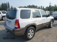 ✅ 2002 Mazda Tribute LX • VIN: 4F2CU08132KM43748 • Lot: 43154216. Listed on IAAI with 161,639 mi. Free auction sales archive from the USA and detailed vehicle history report at DreamBid. Image 4.