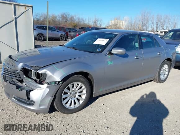 ✅ 2013 Chrysler 300 • VIN: 2C3CCAAG1DH572268 • Lot: 43696932. Listed on IAAI with 159,866 mi. Free auction sales archive from the USA and detailed vehicle history report at DreamBid. Image 2.