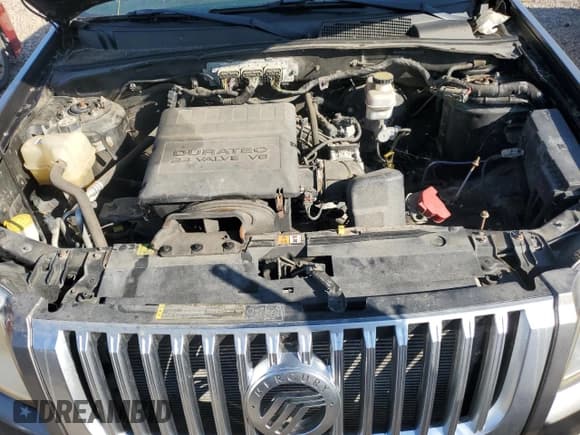 ✅ 2010 Mercury Mariner • VIN: 4M2CN9BG0AKJ07403 • Lot: 80071025. Listed on Copart with 128,074 mi. Free auction sales archive from the USA and detailed vehicle history report at DreamBid. Image 12.