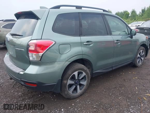 ✅ 2018 Subaru Forester Premium • VIN: JF2SJAEC4JH404549 • Lot: 42916191. Listed on IAAI with 81,904 mi. Free auction sales archive from the USA and detailed vehicle history report at DreamBid. Image 4.