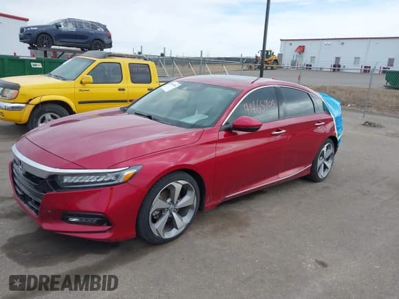 ✅ 2020 Honda Accord Touring • VIN: 1HGCV2F9XLA010745 • Lot: 41865905. Listed on IAAI with 58,929 mi. Free auction sales archive from the USA and detailed vehicle history report at DreamBid. Image 2.