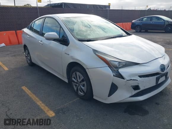 ✅ 2018 Toyota Prius Two • VIN: JTDKBRFU3J3590860 • Lot: 43486808. Listed on IAAI with 92,820 mi. Free auction sales archive from the USA and detailed vehicle history report at DreamBid. Image 1.