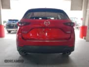 ✅ 2023 Mazda CX-5 S Preferred • VIN: JM3KFBCMXP0290055 • Lot: 43125811. Listed on IAAI with 11,364 mi. Free auction sales archive from the USA and detailed vehicle history report at DreamBid. Image 16.