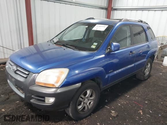 ✅ 2005 Kia Sportage LX • VIN: KNDJE723757109849 • Lot: 41505516. Listed on IAAI with 243,556 mi. Free auction sales archive from the USA and detailed vehicle history report at DreamBid. Image 2.