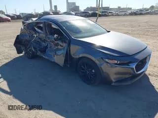 ✅ 2025 Mazda 3 S Select Sport • VIN: 3MZBPABM6SM458570 • Lot: 43407019. Listed on IAAI with 4,652 mi. Free auction sales archive from the USA and detailed vehicle history report at DreamBid. Image 1.