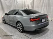 ✅ 2014 Audi A6 Prestige • VIN: WAUHGAFC5EN015025 • Lot: 61234845. Listed on Copart with 119,231 mi. Free auction sales archive from the USA and detailed vehicle history report at DreamBid. Image 3.
