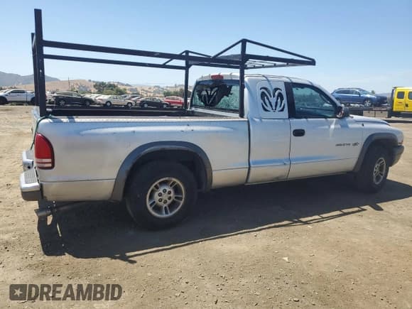 ✅ 2002 Dodge Dakota • VIN: 1B7GL12X32S557546 • Lot: 66879734. Wystawiony na Copart z przebiegiem 218 981 mil. Bezpłatny archiwum sprzedaży aukcyjnych z USA i szczegółowy raport historii pojazdu na DreamBid. Zdjęcie 3.