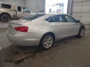 ✅ 2019 Chevrolet Impala LT • VIN: 1G11Z5SA4KU137010 • Lot: 43110143. Listed on IAAI with 185,021 mi. Free auction sales archive from the USA and detailed vehicle history report at DreamBid. Image 4.