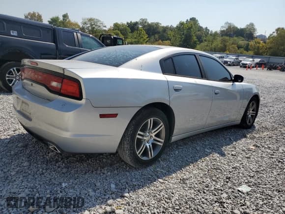 ✅ 2012 Dodge Charger Police • VIN: 2C3CDXAG3CH147889 • Lot: 81496185. Listed on Copart with 215,314 mi. Free auction sales archive from the USA and detailed vehicle history report at DreamBid. Image 3.