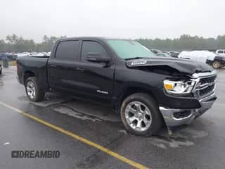 2023 Ram 1500 Lone Star with VIN 1C6RREMT4PN664918, listed as a IAAI auction lot 42942757 with 38,062 mi miles and . Bid and sale history available at DreamBid. Image 1.