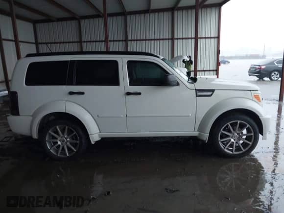 2008 Dodge Nitro R/T with VIN 1D8GT58638W218746, listed as a IAAI auction lot 42200153 with 186,676 mi miles and . Bid and sale history available at DreamBid. Image 13.