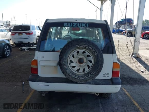 ✅ 1998 Suzuki Sidekick JX • VIN: 2S3TD03V2W6405982 • Лот: 43076345. Опубликован ранее на IAAI с пробегом 152 652 миль. Бесплатный доступ к архиву аукционных продаж из США и подробный отчёт об истории автомобиля на DreamBid. Изображение 16.