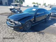 ✅ 2012 Ford Mustang Premium • VIN: 1ZVBP8AM4C5261141 • Lot: 43217325. Listed on IAAI with 129,419 mi. Free auction sales archive from the USA and detailed vehicle history report at DreamBid. Image 2.