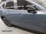 ✅ 2021 Mazda CX-5 Carbon Edition • VIN: JM3KFACY1M0384463 • Lot: 42302688. Listed on IAAI with 65,788 mi. Free auction sales archive from the USA and detailed vehicle history report at DreamBid. Image 13.