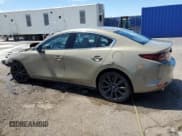 ✅ 2024 Mazda 3 Carbon Edition • VIN: 3MZBPBXY7RM402746 • Lot: 61170235. Listed on Copart with 42,740 mi. Free auction sales archive from the USA and detailed vehicle history report at DreamBid. Image 2.