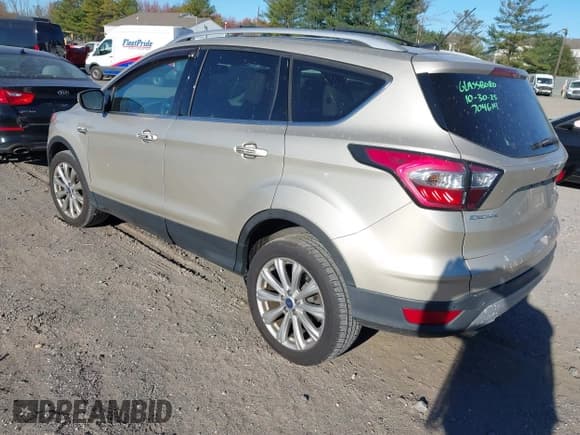 ✅ 2017 Ford Escape Titanium • VIN: 1FMCU0J94HUE28782 • Лот: 43616822. Опубликован ранее на IAAI с пробегом 63 652 миль. Бесплатный доступ к архиву аукционных продаж из США и подробный отчёт об истории автомобиля на DreamBid. Изображение 3.