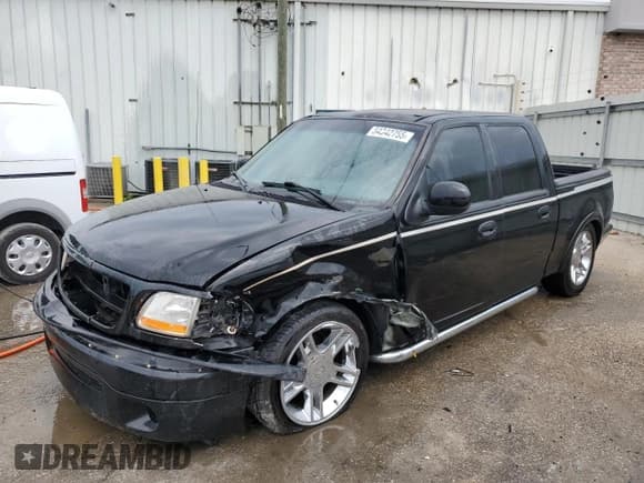 ✅ 2003 Ford F-150 Harley-Davidson • VIN: 1FTRW07333KD41438 • Lot: 54342755. Listed on Copart with 216,391 mi. Free auction sales archive from the USA and detailed vehicle history report at DreamBid. Image 1.
