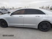 ✅ 2015 Lincoln MKZ • VIN: 3LN6L2J98FR618486 • Lot: 41328946. Listed on IAAI with 167,211 mi. Free auction sales archive from the USA and detailed vehicle history report at DreamBid. Image 14.