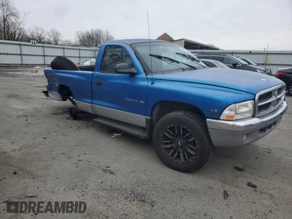 2000 Dodge Dakota Sport z VIN 1B7GG26N0YS530588, wystawiony jako Copart lot #44699515 z przebiegiem Nie podano mil oraz Szkoda całkowita • Salvage title. Historia ofert i sprzedaży dostępna na DreamBid. Obrazek 4.