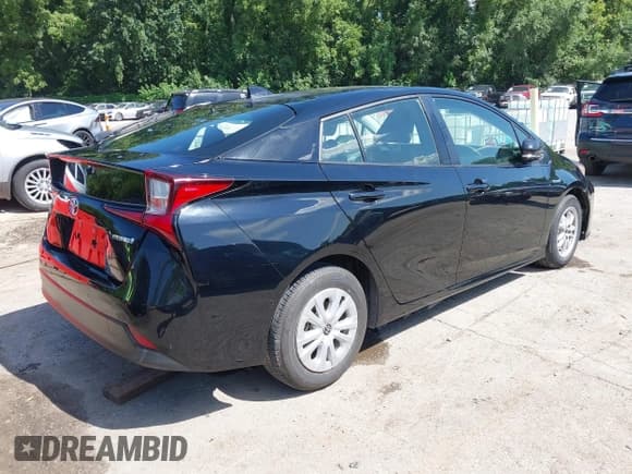 ✅ 2022 Toyota Prius L Eco • VIN: JTDKAMFU4N3184081 • Lot: 42862684. Listed on IAAI with 40,576 mi. Free auction sales archive from the USA and detailed vehicle history report at DreamBid. Image 4.
