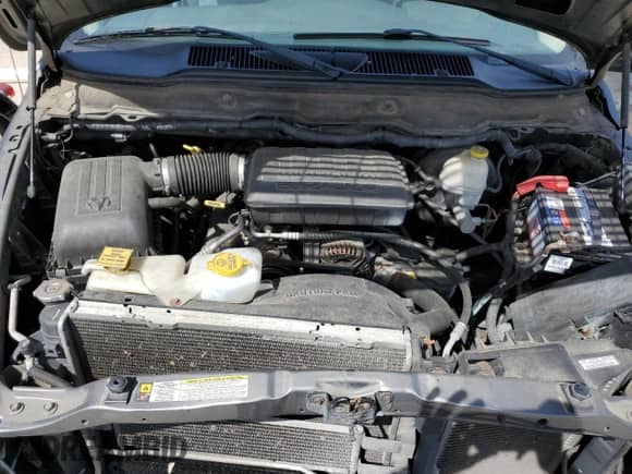 2007 Dodge 1500 SLT z VIN 1D7HU18P77S264612, wystawiony jako Copart lot #69960934 z przebiegiem 202 037 mil mil oraz Szkoda całkowita • Salvage title. Historia ofert i sprzedaży dostępna na DreamBid. Obrazek 11.