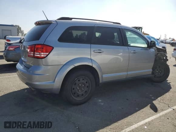 2017 Dodge Journey SE with VIN 3C4PDCAB1HT569099, listed as a Copart auction lot 85314065 with 143,721 mi miles and Salvage title. Bid and sale history available at DreamBid. Image 3.