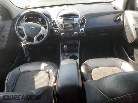 2013 Hyundai Tucson GLS z VIN KM8JUCAC6DU618954, wystawiony jako Copart lot #69253264 z przebiegiem 162 198 mil mil oraz Szkoda całkowita • Salvage title. Historia ofert i sprzedaży dostępna na DreamBid. Obrazek 8.