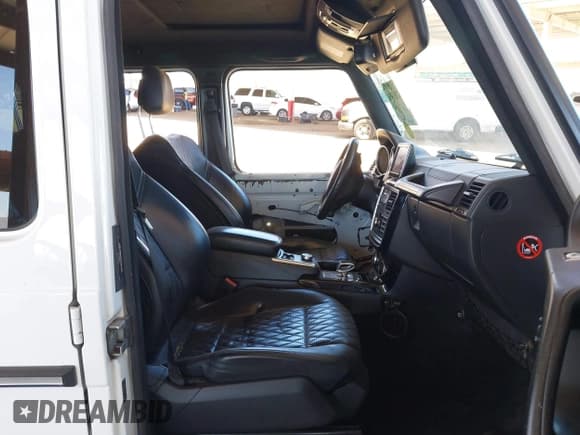 ✅ 2015 Mercedes-Benz G 63 AMG • VIN: WDCYC7DF5FX234579 • Lot: 42057392. Listed on IAAI with 124,585 mi. Free auction sales archive from the USA and detailed vehicle history report at DreamBid. Image 5.