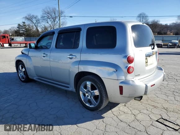 ✅ 2009 Chevrolet HHR 2LT • VIN: 3GNCA53V69S569768 • Lot: 42040165. Listed on Copart with 210,721 mi. Free auction sales archive from the USA and detailed vehicle history report at DreamBid. Image 2.