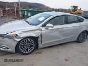 ✅ 2018 Ford Fusion Titanium • VIN: 3FA6P0D92JR206166 • Lot: 43636465. Listed on IAAI with 56,494 mi. Free auction sales archive from the USA and detailed vehicle history report at DreamBid. Image 6.