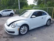 ✅ 2015 Volkswagen Beetle Fleet Edition • VIN: 3VWF17AT2FM656714 • Lot: 42698040. Listed on IAAI with 72,348 mi. Free auction sales archive from the USA and detailed vehicle history report at DreamBid. Image 2.