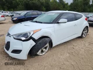 ✅ 2013 Hyundai Veloster w/Gray Int • VIN: KMHTC6AD7DU086801 • Lot: 83954585. Wystawiony na Copart z przebiegiem 139 538 mil. Bezpłatny archiwum sprzedaży aukcyjnych z USA i szczegółowy raport historii pojazdu na DreamBid. Zdjęcie 1.