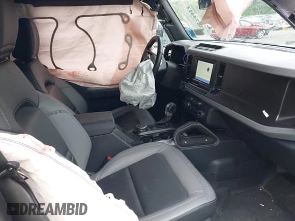 ✅ 2023 Ford Bronco • VIN: 1FMDE5CH6PLC11404 • Lot: 42274412. Listed on IAAI with 5,243 mi. Free auction sales archive from the USA and detailed vehicle history report at DreamBid. Image 5.