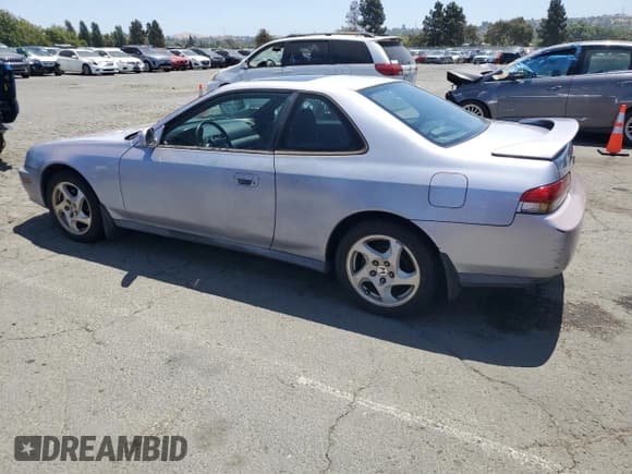 ✅ 1998 Honda Prelude • VIN: JHMBB6146WC002560 • Лот: 60682415. Опубликован ранее на Copart с пробегом 197 102 миль. Бесплатный доступ к архиву аукционных продаж из США и подробный отчёт об истории автомобиля на DreamBid. Изображение 2.