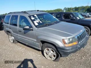✅ 2001 Jeep Grand Cherokee Laredo • VIN: 1J4GW48S31C562074 • Lot: 43209986. Listed on IAAI with Not provided. Free auction sales archive from the USA and detailed vehicle history report at DreamBid. Image 1.