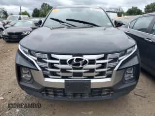 2022 Hyundai Santa Cruz SEL с VIN 5NTJBDAE7NH004395, выставлен на аукционе Copart как лот 68987174 с пробегом Не указан миль и Списание • Salvage title. История ставок и продаж доступна на DreamBid. Изображение 5.
