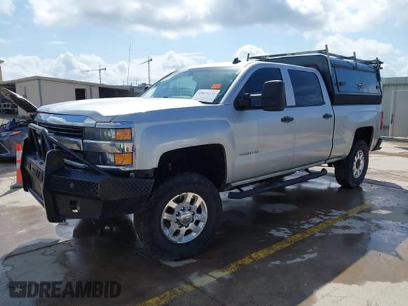 ✅ 2015 Chevrolet Silverado 2500HD LT • VIN: 1GC1KVEG7FF161176 • Lot: 42684231. Listed on IAAI with 242,456 mi. Free auction sales archive from the USA and detailed vehicle history report at DreamBid. Image 2.