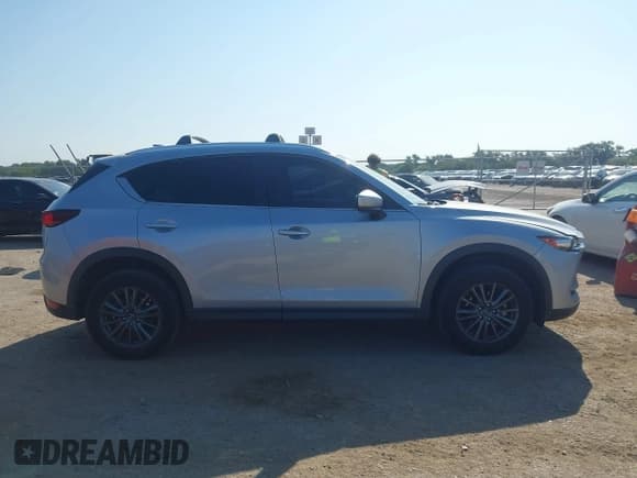 ✅ 2019 Mazda CX-5 Sport • VIN: JM3KFABM2K1562323 • Lot: 43209408. Wystawiony na IAAI z przebiegiem 74 031 mil. Bezpłatny archiwum sprzedaży aukcyjnych z USA i szczegółowy raport historii pojazdu na DreamBid. Zdjęcie 13.