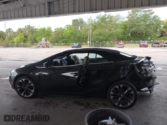 ✅ 2016 Buick Cascada Premium • VIN: W04WT3N5XGG072858 • Лот: 42204731. Опубликован ранее на IAAI с пробегом 75 309 миль. Бесплатный доступ к архиву аукционных продаж из США и подробный отчёт об истории автомобиля на DreamBid. Изображение 14.