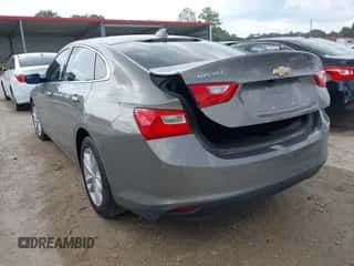 2018 Chevrolet Malibu LT z VIN 1G1ZD5ST0JF125698, wystawiony jako IAAI lot #43350122 z przebiegiem 149 975 mil mil oraz . Historia ofert i sprzedaży dostępna na DreamBid. Obrazek 3.