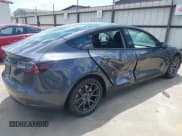 ✅ 2022 Tesla Model 3 • VIN: 5YJ3E1EA0NF206479 • Lot: 43176382. Wystawiony na IAAI z przebiegiem 56 793 mil. Bezpłatny archiwum sprzedaży aukcyjnych z USA i szczegółowy raport historii pojazdu na DreamBid. Zdjęcie 4.