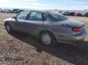 ✅ 1999 Ford Taurus SE • VIN: 1FAFP53U1XG314975 • Lot: 43888557. Wystawiony na IAAI z przebiegiem 109 373 mil. Bezpłatny archiwum sprzedaży aukcyjnych z USA i szczegółowy raport historii pojazdu na DreamBid. Zdjęcie 3.