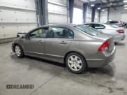 ✅ 2007 Honda Civic LX • VIN: 1HGFA16557L121018 • Lot: 87470145. Wystawiony na Copart z przebiegiem 239 782 mil. Bezpłatny archiwum sprzedaży aukcyjnych z USA i szczegółowy raport historii pojazdu na DreamBid. Zdjęcie 2.