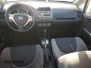 ✅ 2007 Honda Fit • VIN: JHMGD38447S802673 • Lot: 84243965. Listed on Copart with 183,457 mi. Free auction sales archive from the USA and detailed vehicle history report at DreamBid. Image 8.