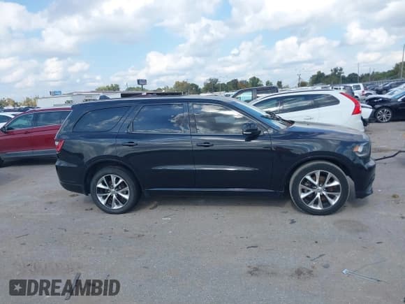 ✅ 2014 Dodge Durango R/T • VIN: 1C4SDHCT4EC360346 • Лот: 43744124. Опубликован ранее на IAAI с пробегом 199 044 миль. Бесплатный доступ к архиву аукционных продаж из США и подробный отчёт об истории автомобиля на DreamBid. Изображение 13.