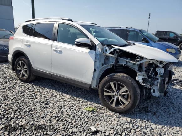 ✅ 2016 Toyota RAV4 XLE • VIN: JTMRFREV2GD185590 • Lot: 57505605. Listed on Copart with 75,545 mi. Free auction sales archive from the USA and detailed vehicle history report at DreamBid. Image 4.